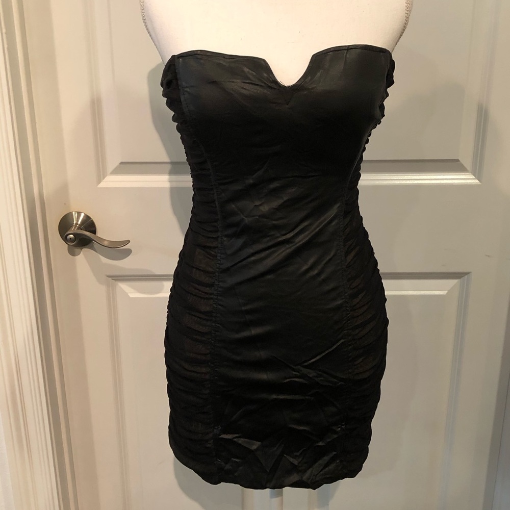 Black fitted BeBe strapless dress
